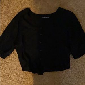 black b-neck button up shirt
